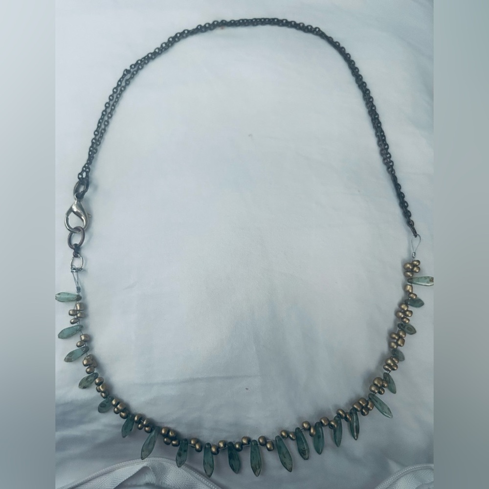 Tear drop leaves necklace in green. Double chained .